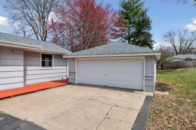 detached garage with fence