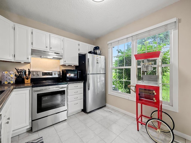 11004 Oregon Curv, Bloomington, MN 55438 - kitchen with appliances with stainless steel finishes, under cabinet range hood, dark countertops, white cabinets, and a textured ceiling