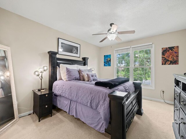 11004 Oregon Curv, Bloomington, MN 55438 - bedroom featuring light colored carpet, a textured ceiling, and ceiling fan