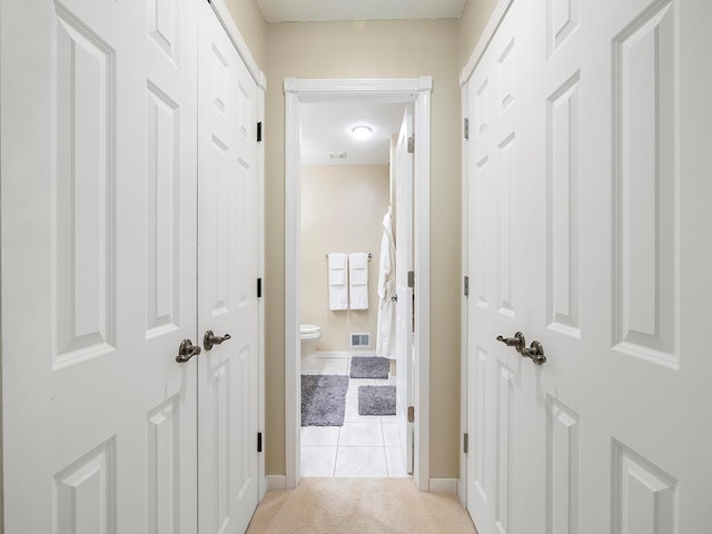 11004 Oregon Curv, Bloomington, MN 55438 - hall featuring light carpet and light tile patterned flooring