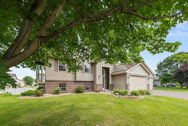 367 Garden Dr, Delano, MN 55328 - view of front of home featuring a garage and driveway