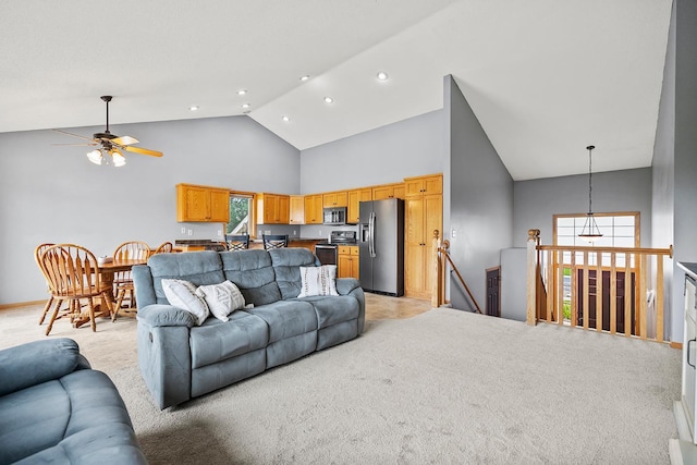 367 Garden Dr, Delano, MN 55328 - living room with high vaulted ceiling, recessed lighting, a ceiling fan, and light colored carpet