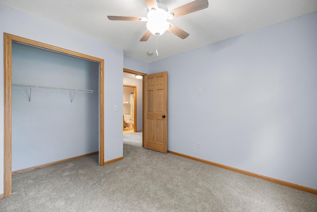 367 Garden Dr, Delano, MN 55328 - unfurnished bedroom featuring carpet, a closet, and ceiling fan