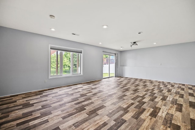 367 Garden Dr, Delano, MN 55328 - spare room featuring wood finished floors and recessed lighting