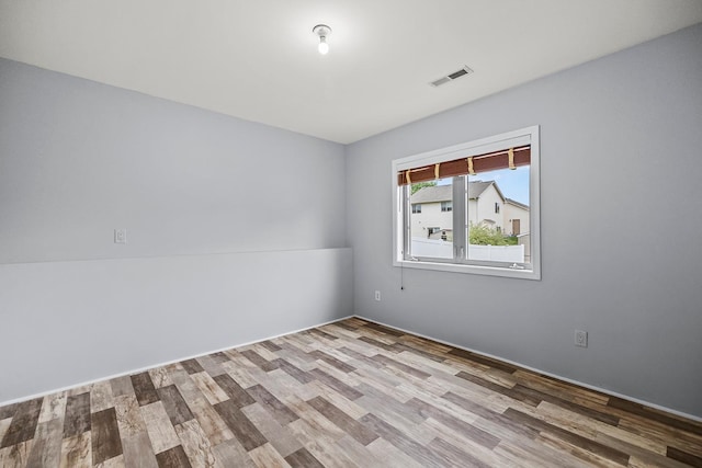 367 Garden Dr, Delano, MN 55328 - unfurnished room with wood finished floors