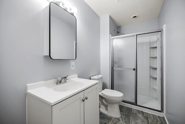 367 Garden Dr, Delano, MN 55328 - full bathroom with a shower stall, vanity, and stone finish floors