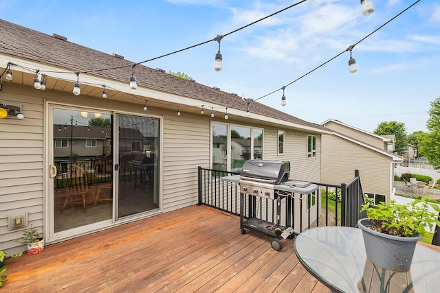 367 Garden Dr, Delano, MN 55328 - wooden deck with a grill