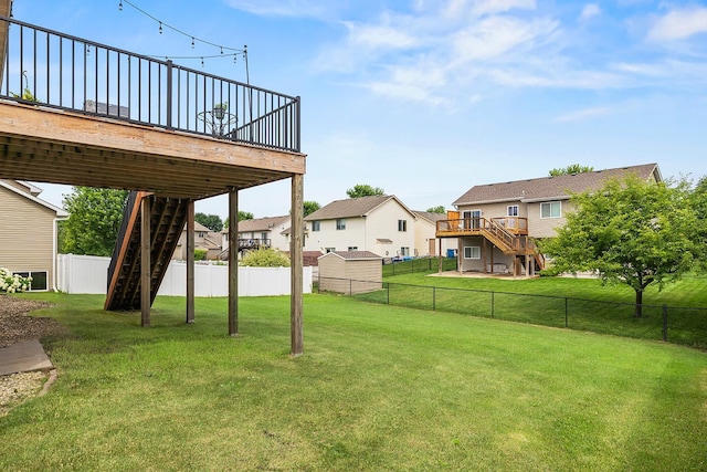 367 Garden Dr, Delano, MN 55328 - fenced backyard featuring stairway, a wooden deck, and a residential view