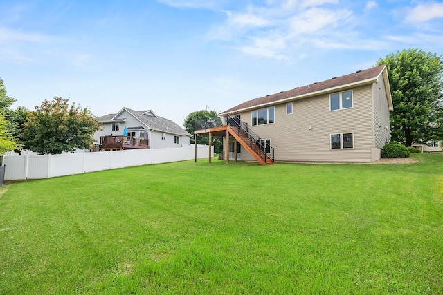 367 Garden Dr, Delano, MN 55328 - back of house with stairs and a wooden deck