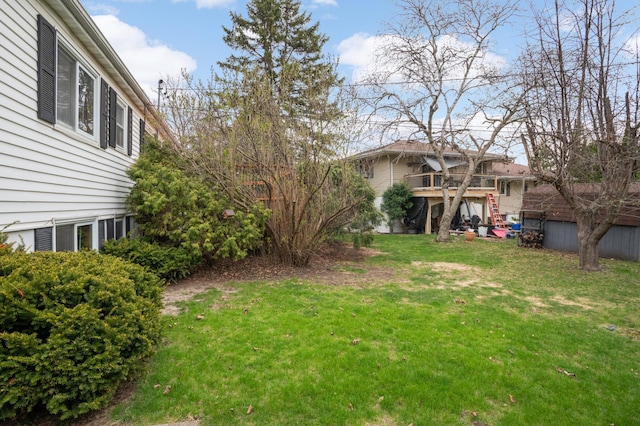 view of yard with stairs and a wooden deck