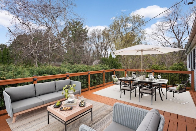wooden deck featuring outdoor dining area and outdoor lounge area