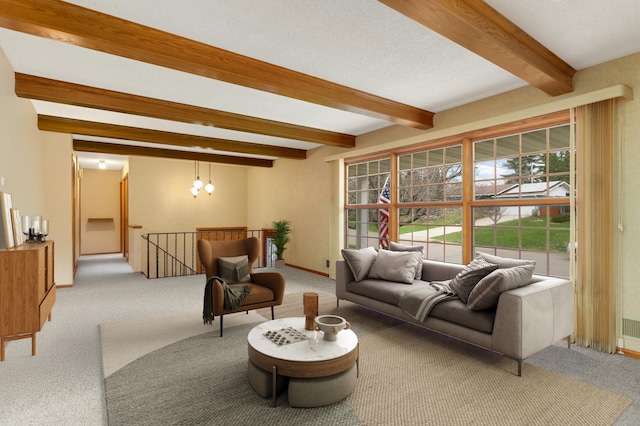 3308 Gate Rd, Saint Anthony, MN 55418 - carpeted living area featuring beamed ceiling and a chandelier