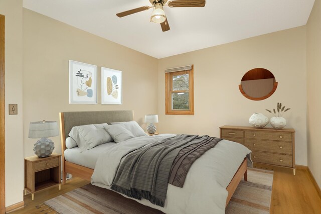 3308 Gate Rd, Saint Anthony, MN 55418 - bedroom featuring light wood-type flooring, ceiling fan, and baseboards