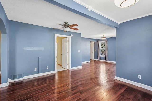 919 6th Ave S, Stillwater, MN 55082 - empty room featuring a textured ceiling, arched walkways, hardwood / wood-style flooring, a ceiling fan, and crown molding