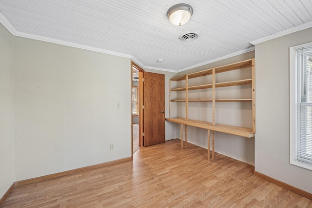 919 6th Ave S, Stillwater, MN 55082 - unfurnished room with crown molding, wood finished floors, and healthy amount of natural light