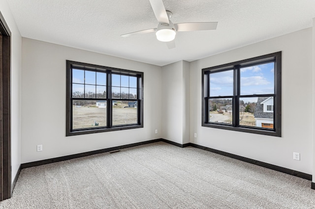 3731 Crestwood Rdg NE, Alexandria Twp, MN 56308 - unfurnished bedroom with a ceiling fan, a textured ceiling, carpet floors, baseboards, and visible vents