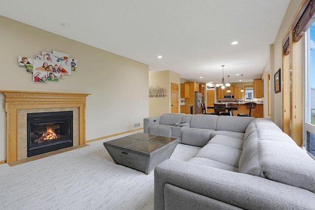 27130 Hickory Ridge Dr, Elko New Market, MN 55020 - living area with recessed lighting, a notable chandelier, visible vents, and light carpet