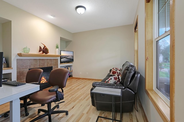 27130 Hickory Ridge Dr, Elko New Market, MN 55020 - office with a wealth of natural light, baseboards, and wood finished floors