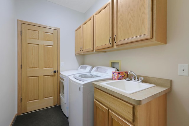 27130 Hickory Ridge Dr, Elko New Market, MN 55020 - washroom with washing machine and dryer, a sink, and cabinet space