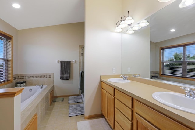 27130 Hickory Ridge Dr, Elko New Market, MN 55020 - full bath with tile patterned floors, a garden tub, a sink, and a stall shower
