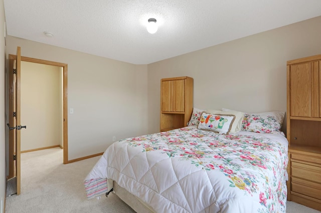 27130 Hickory Ridge Dr, Elko New Market, MN 55020 - bedroom featuring light carpet, baseboards, and a textured ceiling