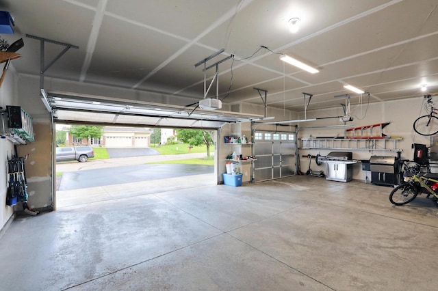 27130 Hickory Ridge Dr, Elko New Market, MN 55020 - garage featuring a garage door opener