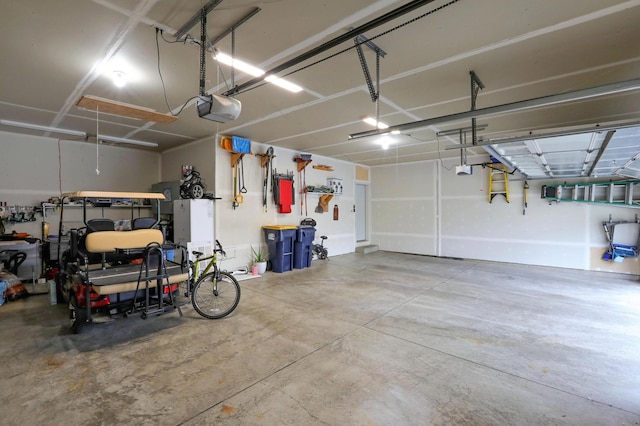 27130 Hickory Ridge Dr, Elko New Market, MN 55020 - garage featuring a garage door opener