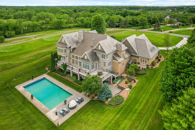 aerial view featuring a view of trees
