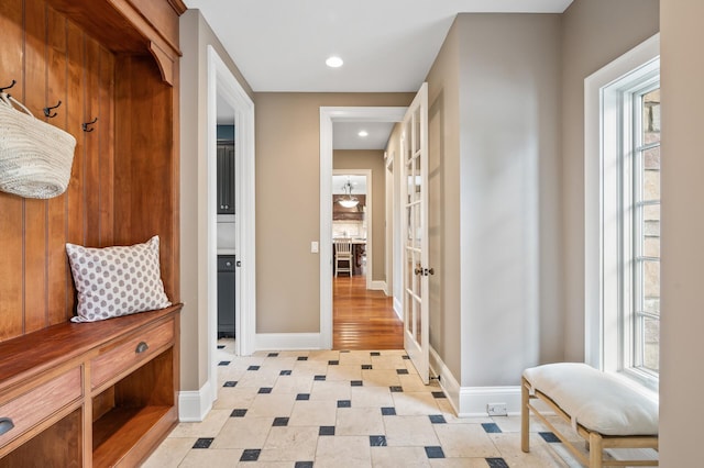 mudroom featuring baseboards and recessed lighting