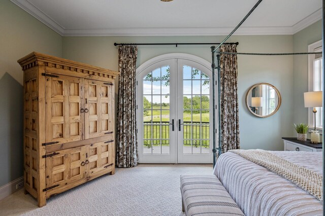 bedroom with crown molding, french doors, access to outside, and carpet floors