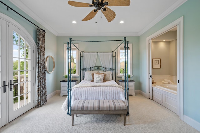 bedroom featuring access to exterior, multiple windows, light carpet, and baseboards