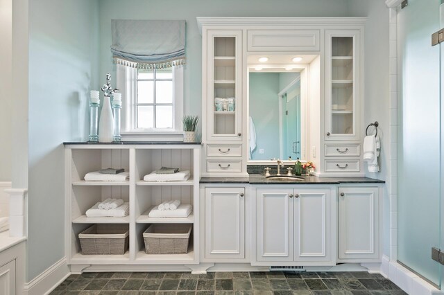 interior space featuring visible vents and a sink