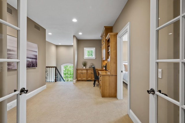carpeted office space with french doors, baseboards, visible vents, and recessed lighting