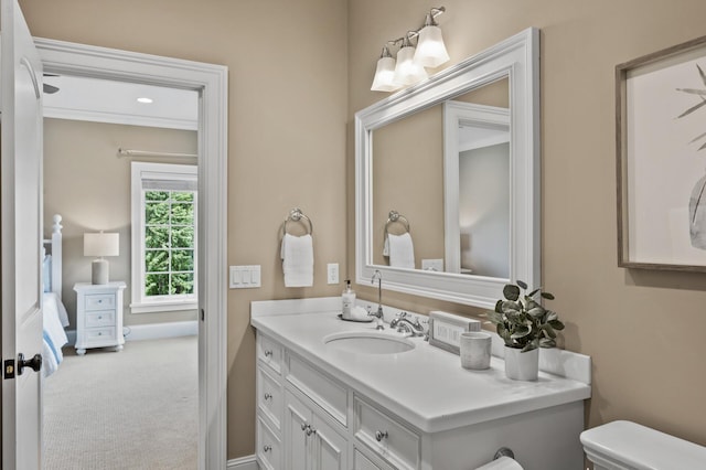 bathroom with vanity and toilet
