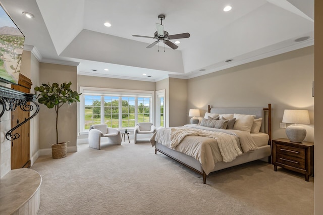 bedroom with a raised ceiling, a ceiling fan, crown molding, recessed lighting, and light carpet