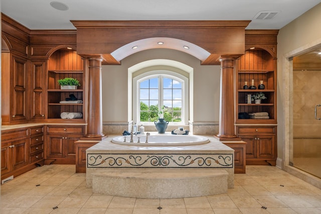 bathroom with visible vents, tile patterned floors, and a stall shower