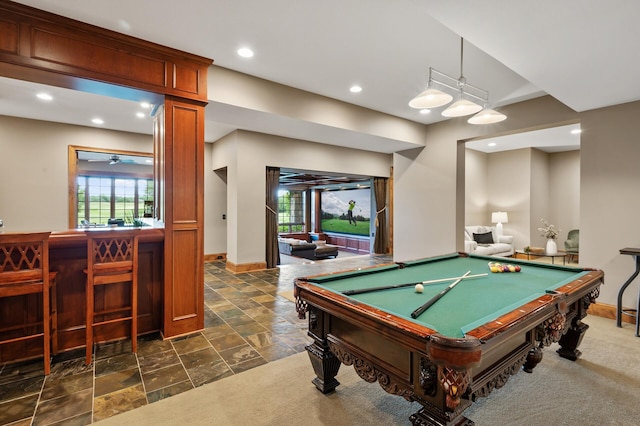 playroom with baseboards, billiards, recessed lighting, a bar, and stone tile floors