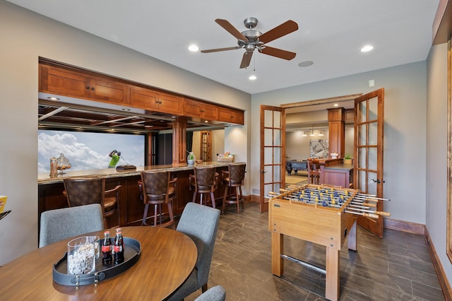 playroom featuring bar area, baseboards, a ceiling fan, and recessed lighting