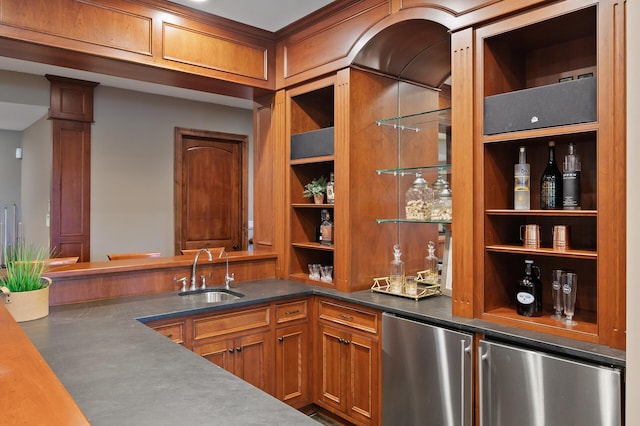 bar with refrigerator, a sink, and indoor bar