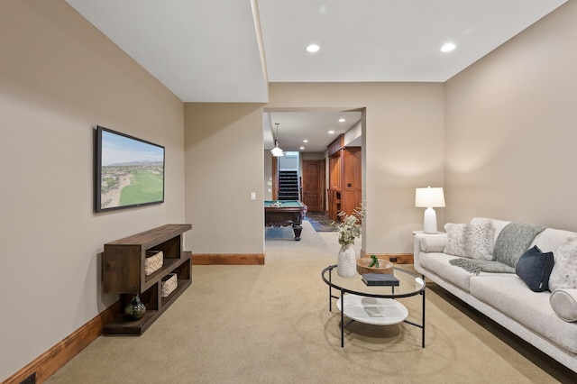 living room featuring light carpet, recessed lighting, baseboards, and pool table