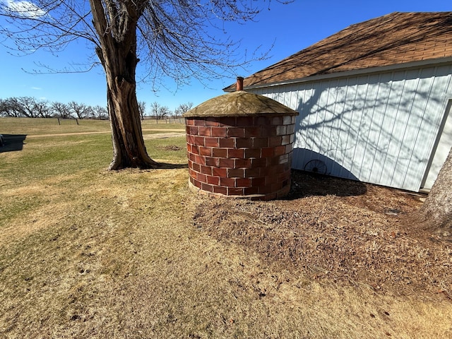 view of home's exterior with a lawn
