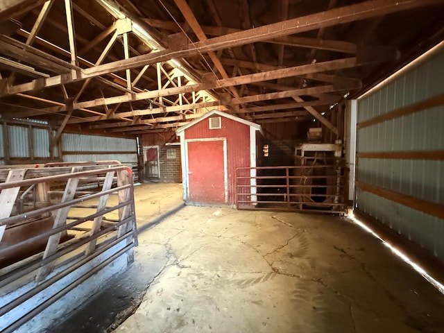 view of horse barn featuring visible vents