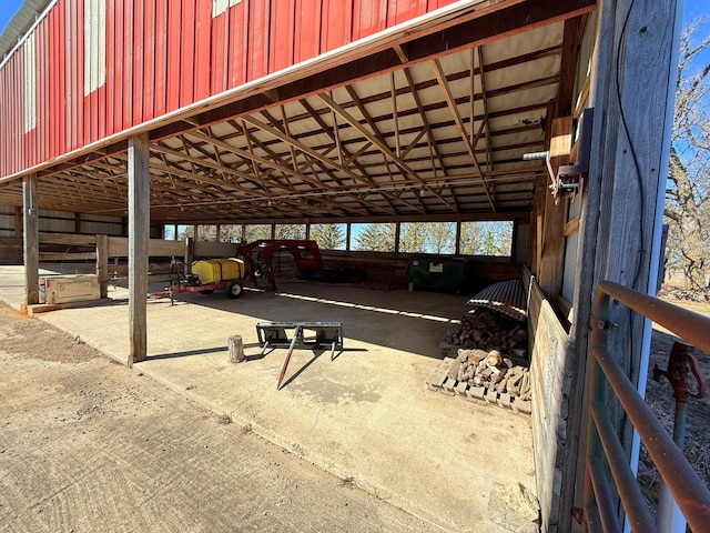 view of vehicle parking with an exterior structure