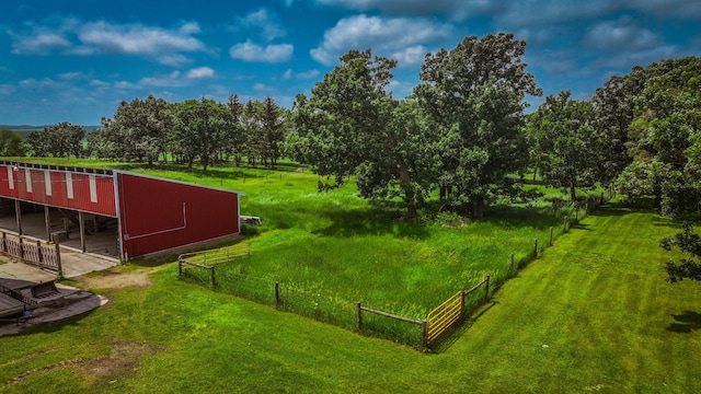 20343 680th Ave, Alden, MN 56009 - view of yard featuring an outbuilding and view of wooded area