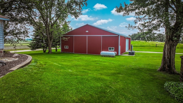 20343 680th Ave, Alden, MN 56009 - view of pole building featuring a lawn