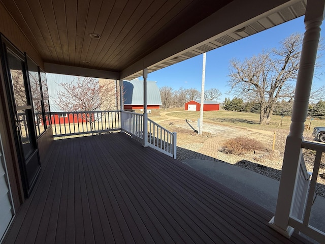 20343 680th Ave, Alden, MN 56009 - wooden terrace with an outbuilding
