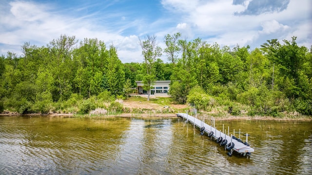 4681 Mission Rd NE, Sugar Bush Twp, MN 56601 - dock area featuring a water view and a wooded view