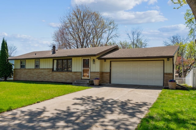 ranch-style house featuring brick siding, a garage, driveway, a shingled roof, and a front yard