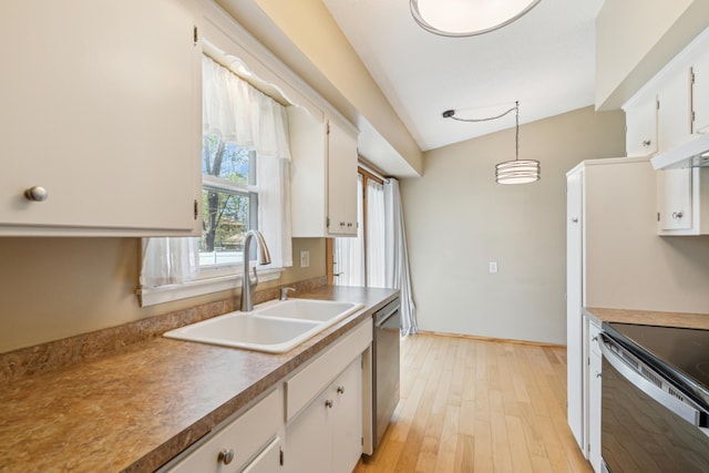 kitchen with a sink, stainless steel appliances, white cabinetry, under cabinet range hood, and light wood-type flooring