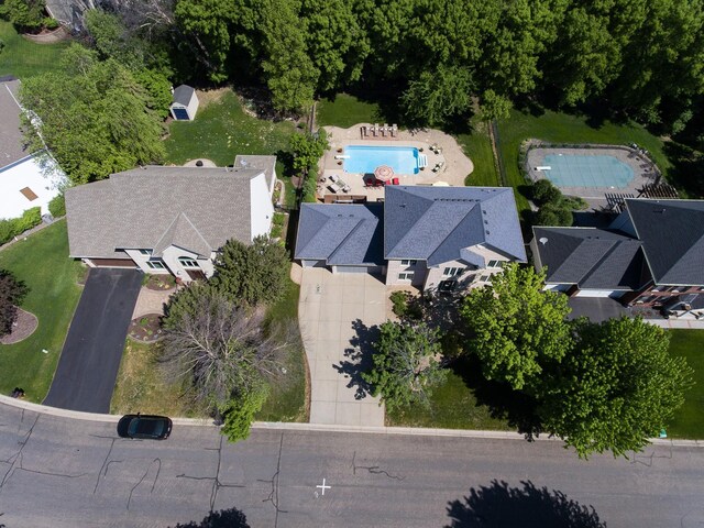 aerial view of property's location featuring a pool